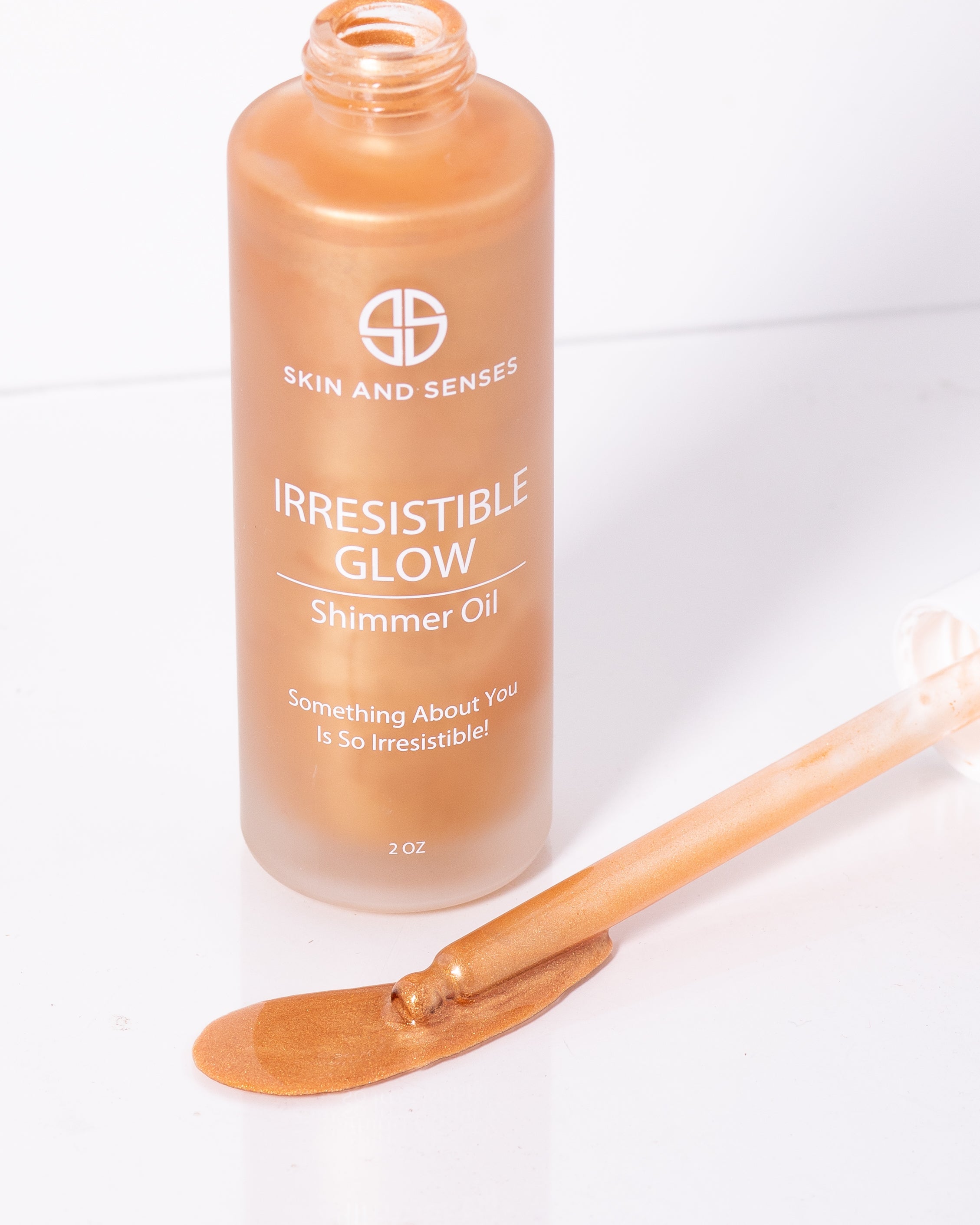 Irresistible Glow Shimmer Oil, skin and senses